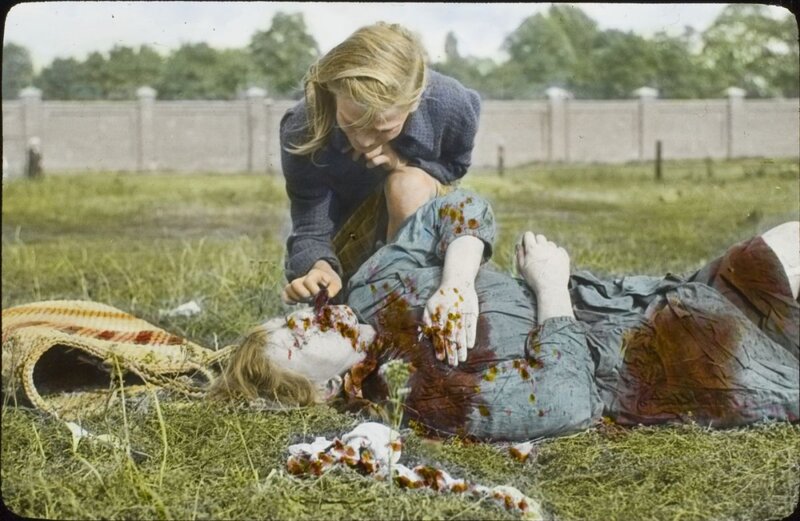 12-year-old Kazimiera Kostewicz (Mika) over the body of her sister killed in an air raid, 9 September 1939 (AIPN/Julien Bryan collection in Warsaw)