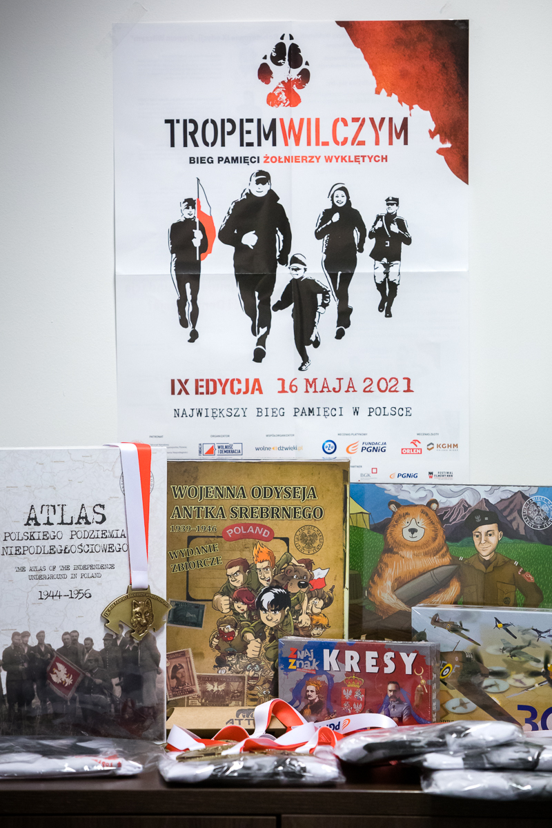 IPN&#039;s educational materials and the Wolf&#039;s Trail Run poster. Photo: Sławek Kasper (IPN)